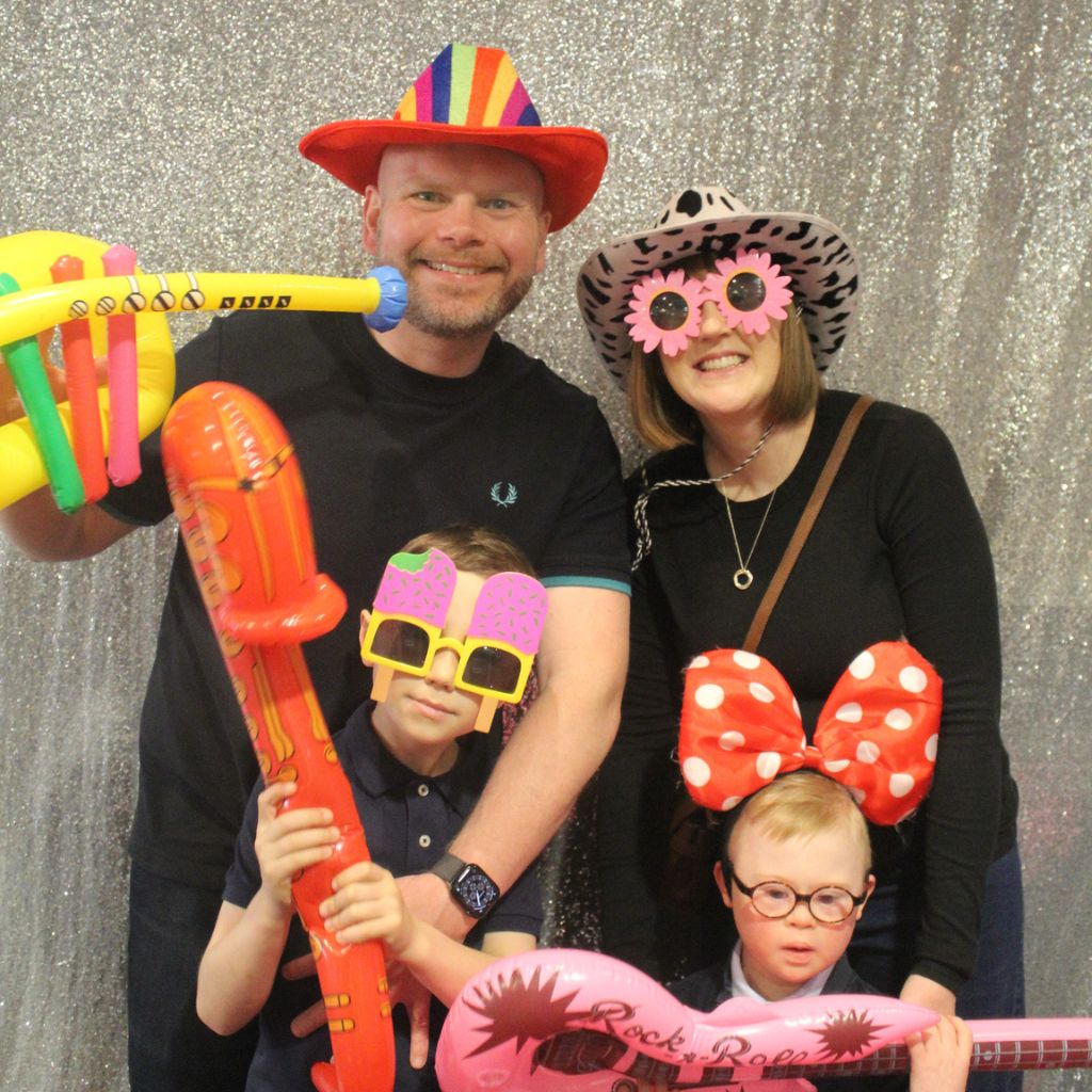 A family in the photo booth