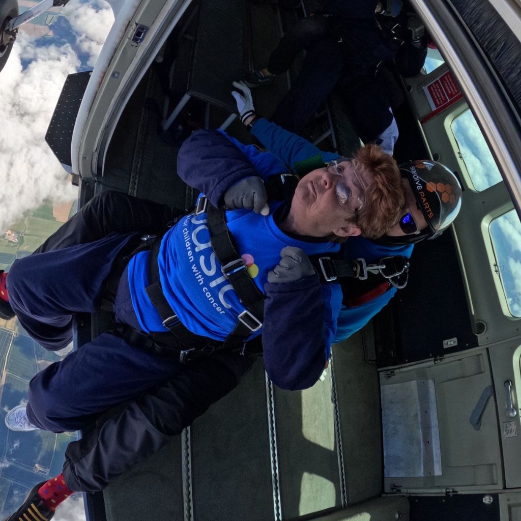 Skydiver leaves the plane